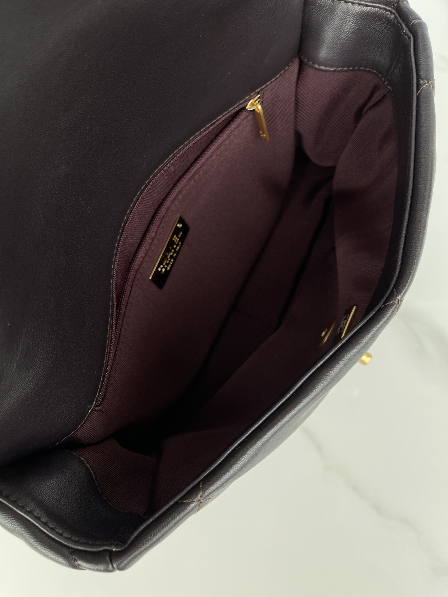 Ch*el 19 large handbag shiny leather, gold-tone, silver-tone & ruthenium-finish metal black 7.8 × 11.7 × 3.9 in