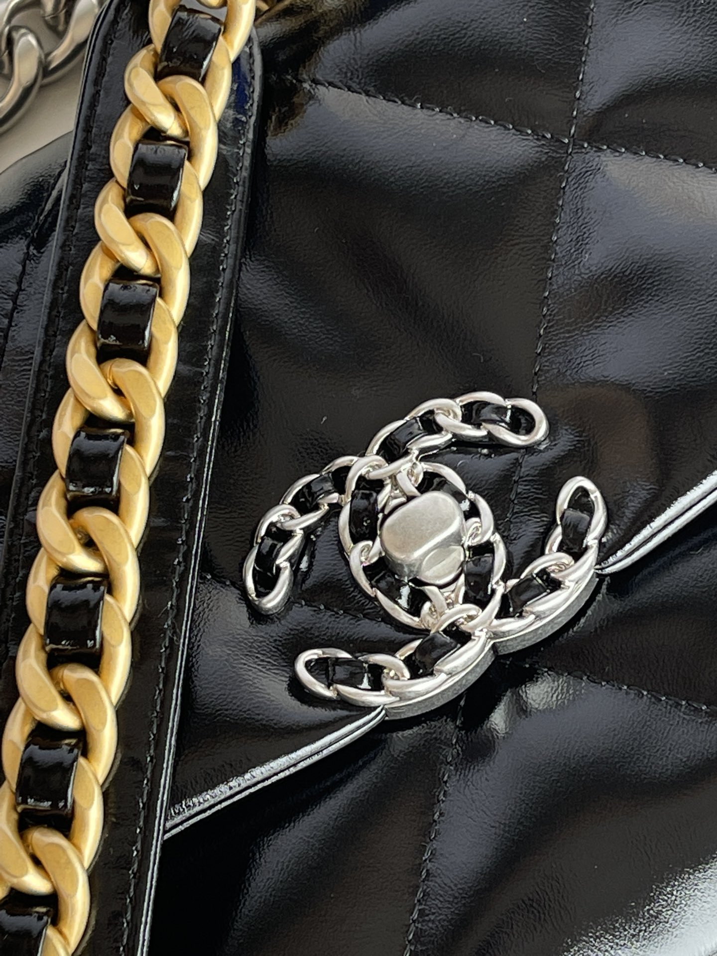 Ch*el 19 large handbag shiny leather, gold-tone, silver-tone & ruthenium-finish metal black 7.8 × 11.7 × 3.9 in