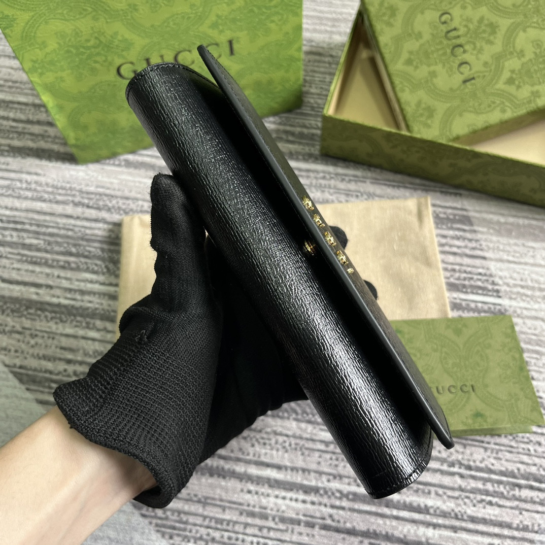 continental wallet with G*u*i script  7.5"w x 4"h x 1.4"d