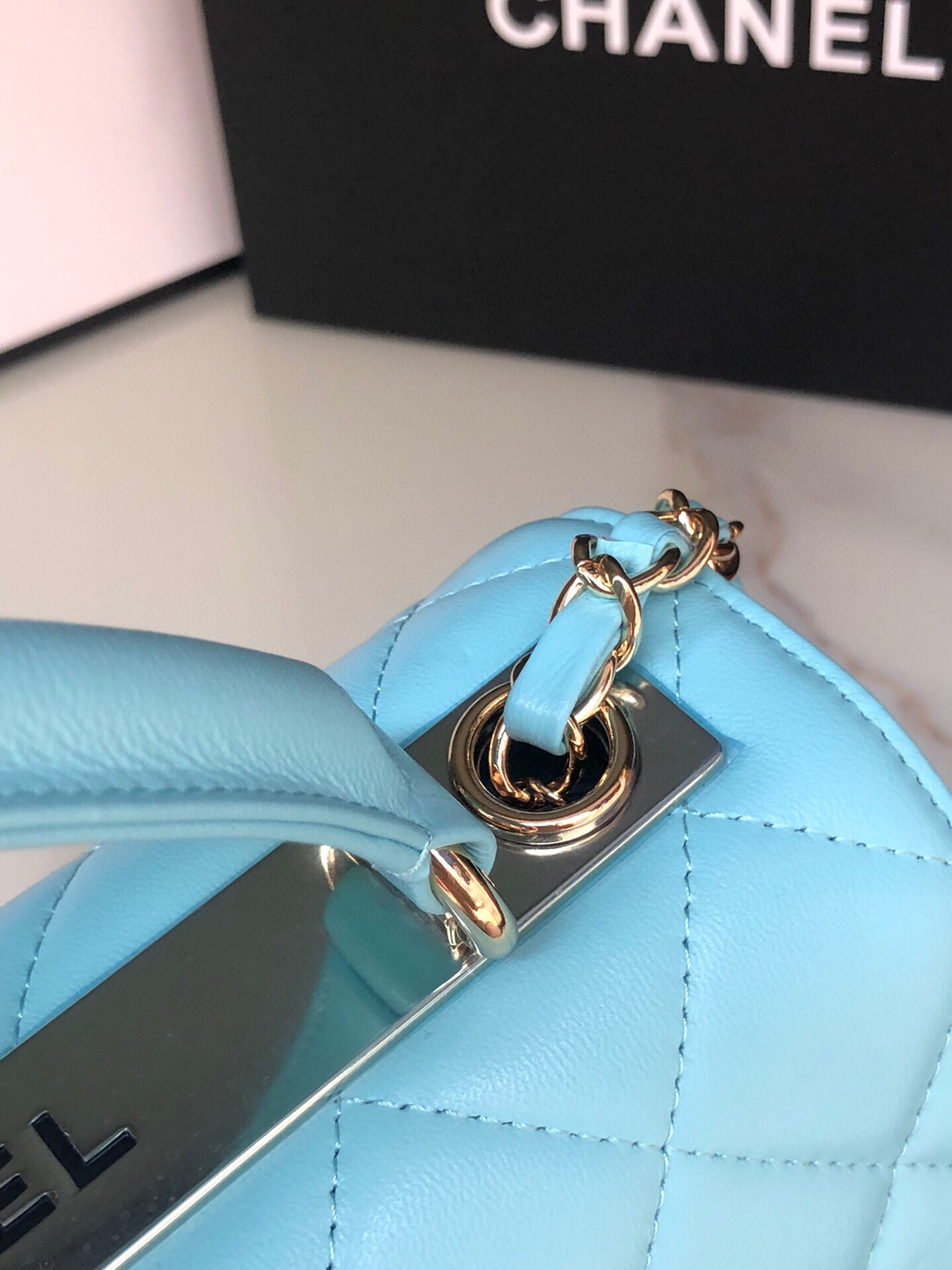 Ch*el flap bag with top handle 6.6 × 9.8 × 4.7 in