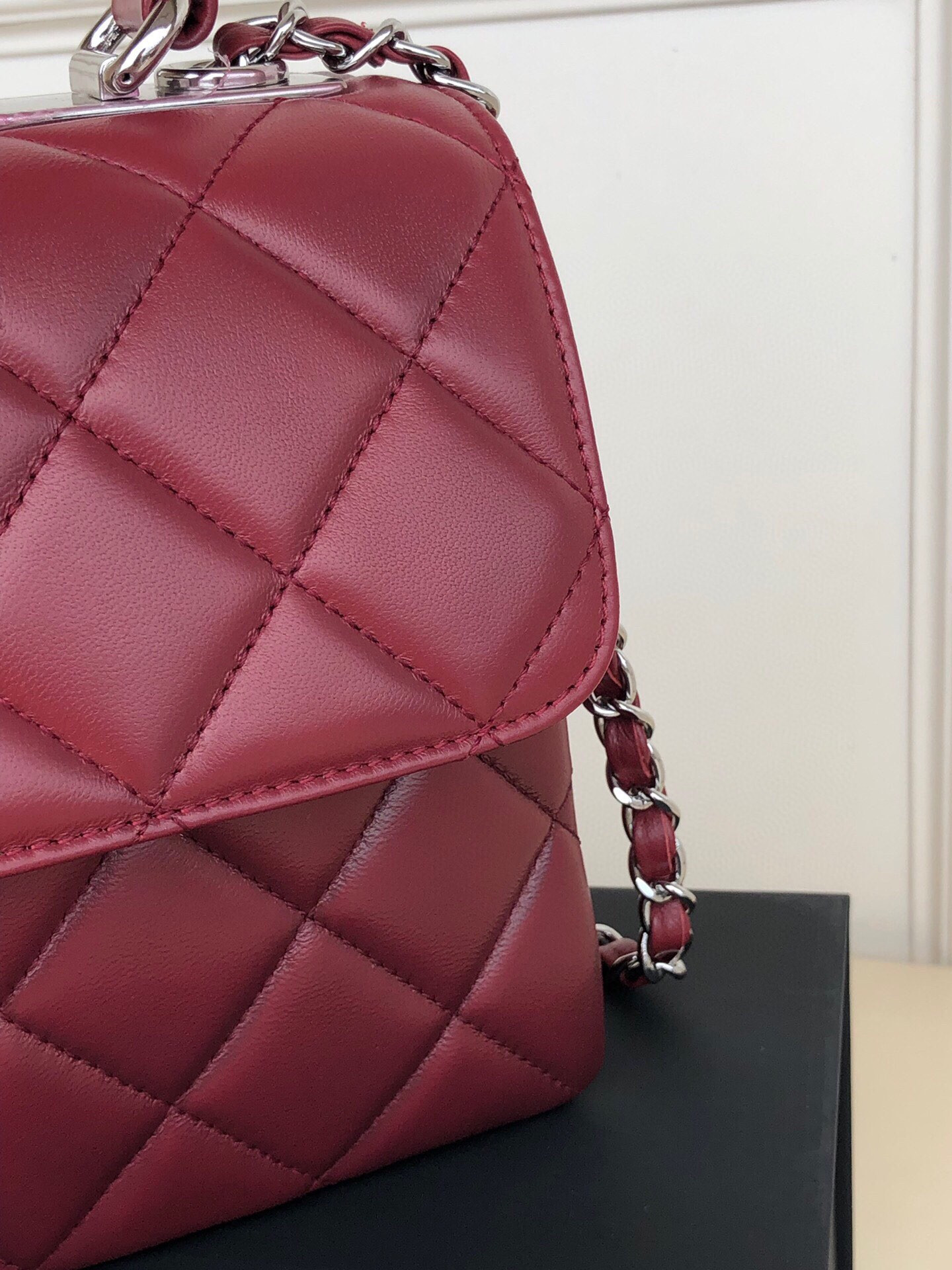 Ch*el flap bag with top handle 6.6 × 9.8 × 4.7 in