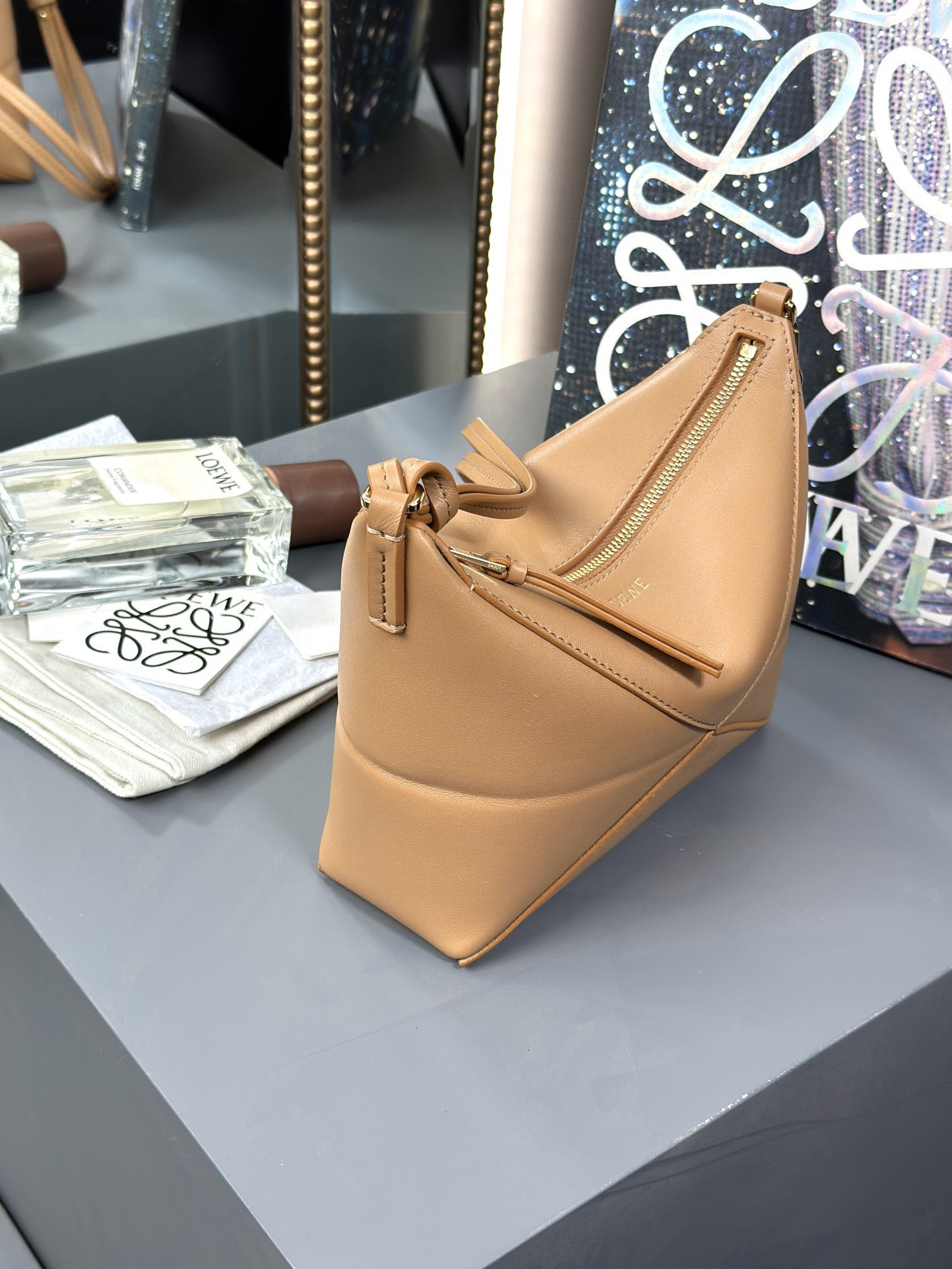 L0ew* puzzle fold pouch in shiny nappa calfskin 15.5x23x6.5cm